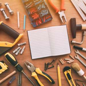 top-view-of-handyman-housework-repairing-tools-2021-08-26-23-03-02-utc-scaled-min